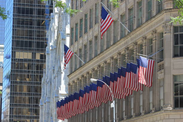 istock America Flags on Saks Fifth Avenue NYC 1402699109