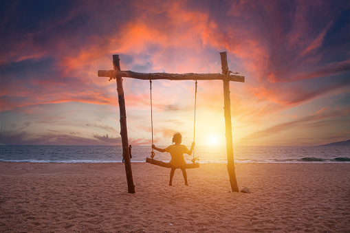 kid swinging on beach near Udupi, Karnataka