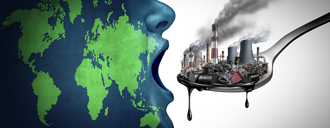 Global pollution concept with fossil fuel and industrial toxic waste as the planet earth eating petroleum and dirty polluted energy as an environmental icon with 3D illustration elements.