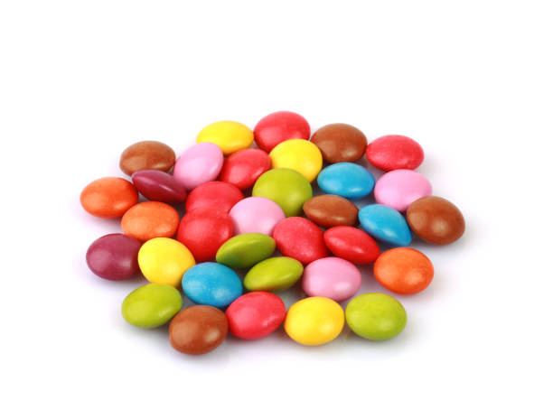 istock Colorful candies isolated on white background 1402701787