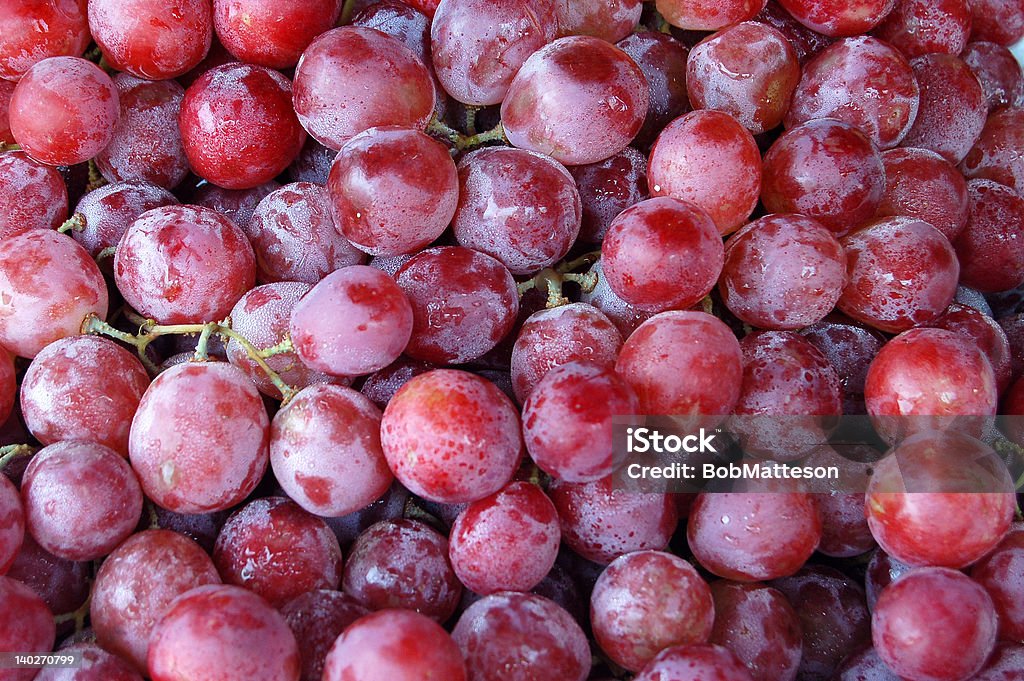 Delecious uva rossa - Foto stock royalty-free di Uva nera