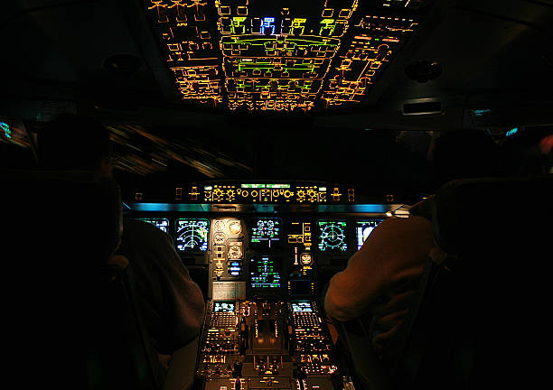 istock Airplane cockpit at night, approach and landing 140271207