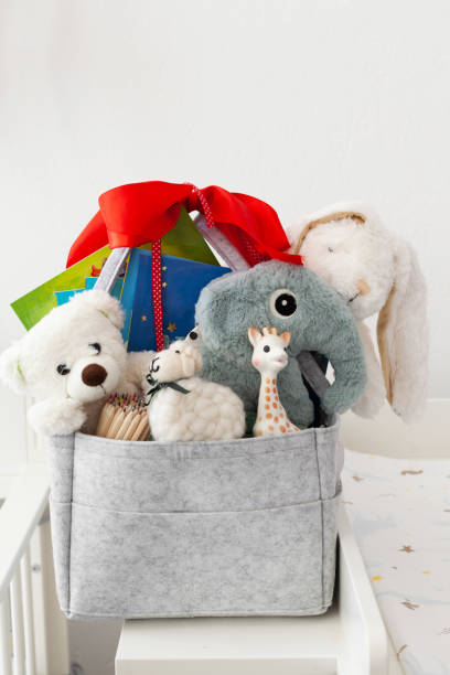 istock Mothers bag with toy and accessories on white background 1402713264