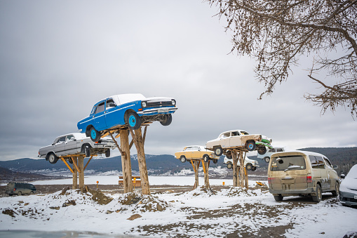 Altai, Russia - May 8, 2022: Monuments to russian retro cars - privet museum in open air in Altay Mountains, Siberia, Russia. High quality photo