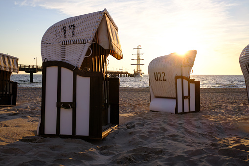 Strandkorb beach-chairs for hire on a beach at the baltic sea in Bansin, Usedom, Germany