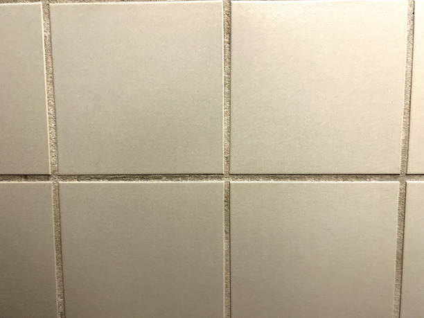 Very old white tiles as texture or background.