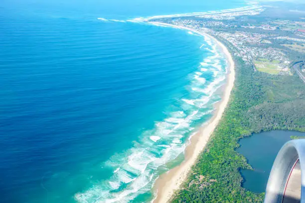 Out plane window view of beach and coastal area at Coolagatta, Queensland Australia.