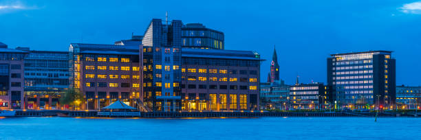 istock Modern harbor waterfront developments illuminated at dusk panorama Copenhagen Denmark 1402718525