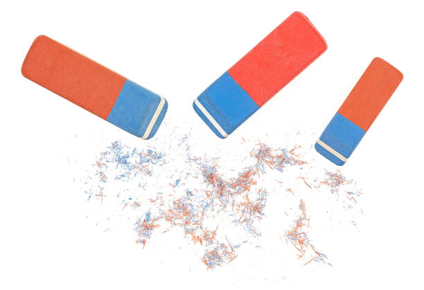 istock Red and blue erasers and eraser shavings isolated on a white background, top view. Correcting errors. 1402720551
