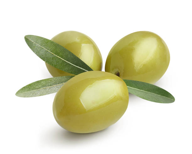 istock Delicious green olives with leaves on white 1402720723