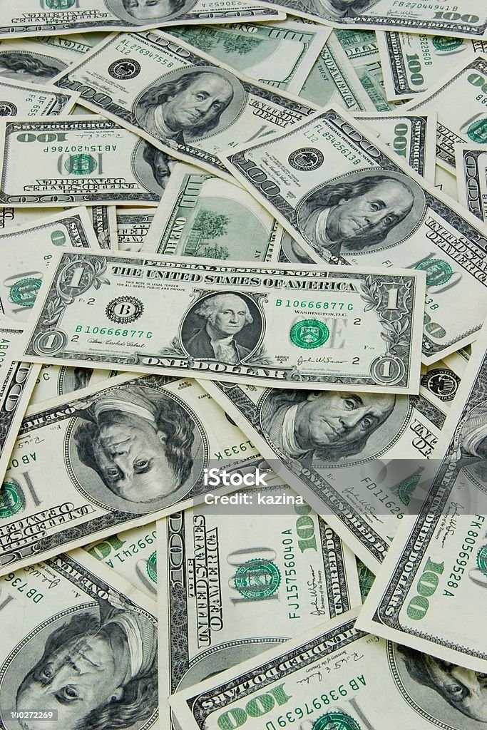 Hundreds dollars and one Different Benjamin smiles like Mona Lisa when near is Washington ;) Abundance Stock Photo