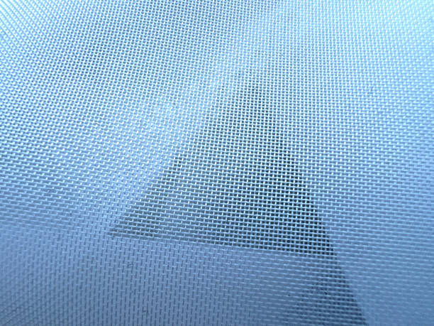 istock A fine white fabric of a curtain as a texture or background. 1402723366