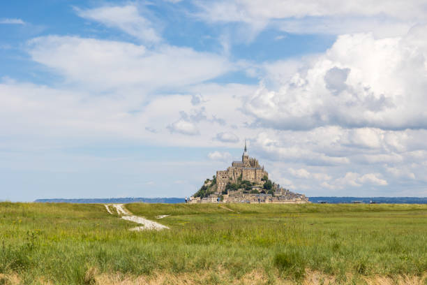 istock View on the Mont Saint-Michel above a pasture 1402723665