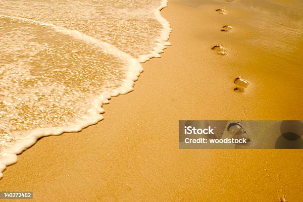 Beach Footsteps Stock Photo - Download Image Now - Coastline, Footprint, Tide
