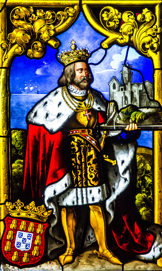 Sintra, Portugal - May 30, 2022: Saint on vitrage window icon in Sintra church.