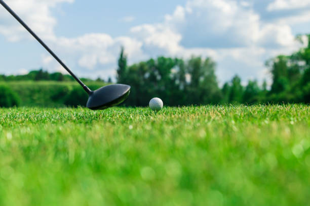 istock Playing golf. Golf course. Golf ball and club. 1402725882
