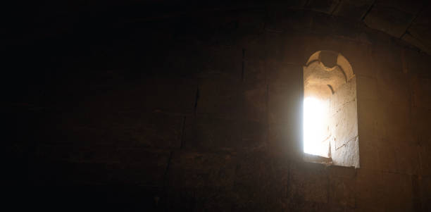 istock Dark view. Window in the church 1402726083