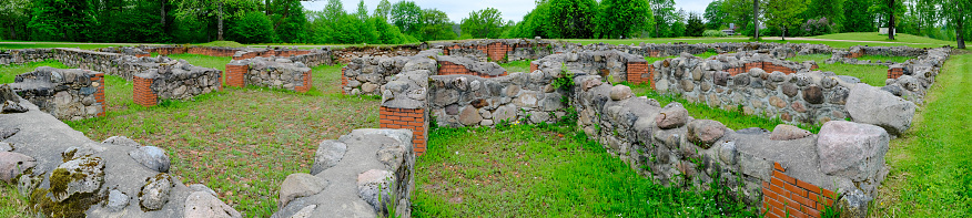 Stone foundation of an old ruined house or building