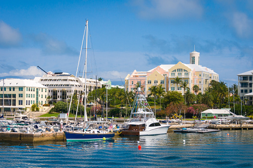 Overview of Hamilton, Bermuda waterfront marina with docked vessels.
