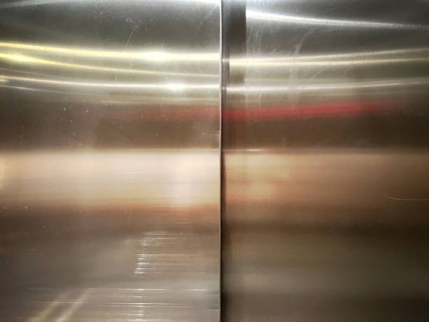 istock The beautiful metallic doors of an elevator. 1402731488