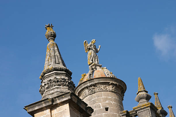 Stone Angel Statue in a church cupola, cathedral of Sherry Stone Angel Statue in a church cupola, cathedral of Sherry  ancient creativity andalusia architecture stock pictures, royalty-free photos & images