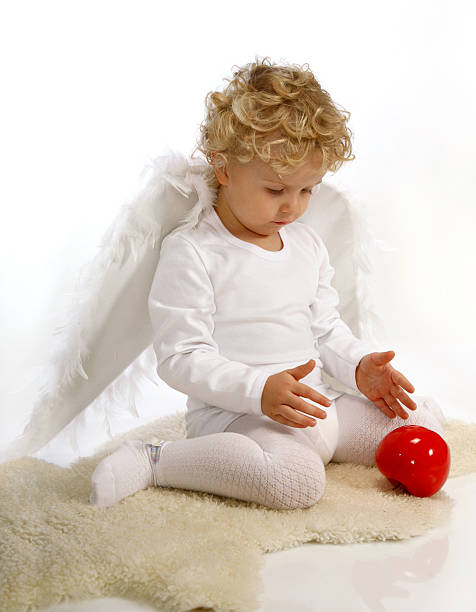 little boy as an angel stock photo