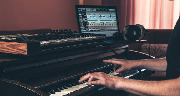 istock Electronic piano and guitar in room interior. 1402737269