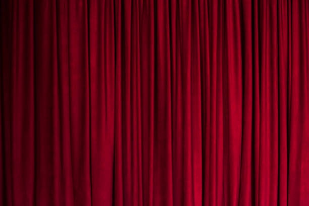 istock Red background, red curtain texture, theater curtain. 1402738150