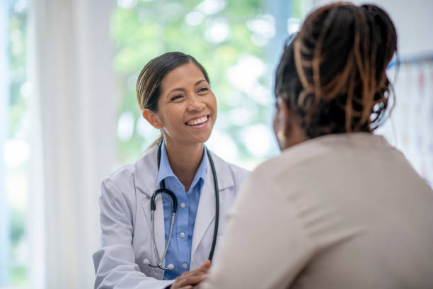 istock Senior Woman At a Check-Up 1402738478