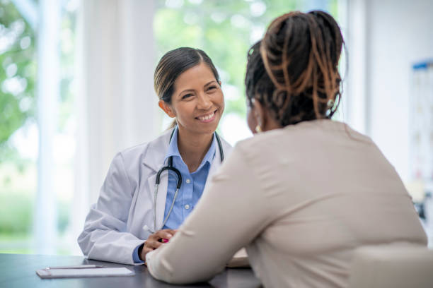 istock Senior Woman At a Check-Up 1402738993