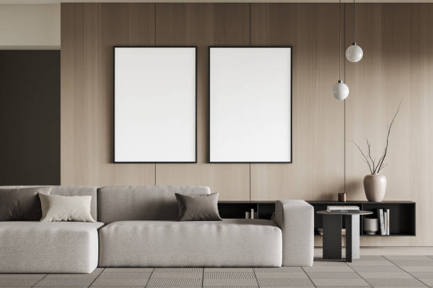 istock Bright living room interior with two empty white posters 1402739345