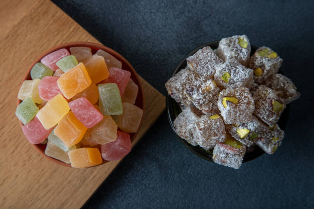 istock Two bowls of multi colored Turkish delight ,directly above 1402739393