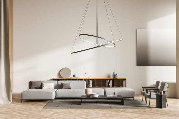 istock Light living room interior with sofa and coffee table, shelf with decoration 1402739402