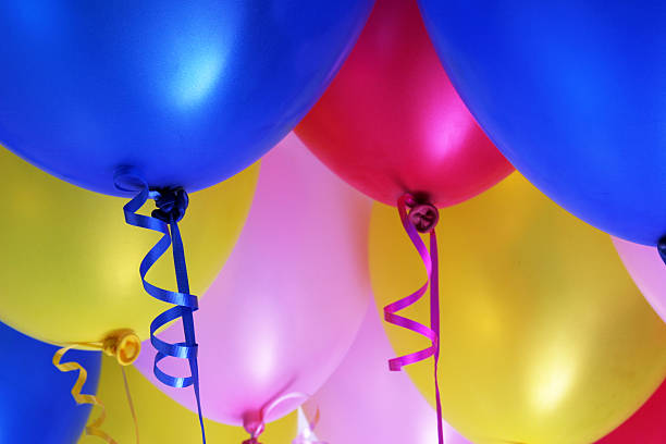 Blue, Red, Pink and Yellow Colored Balloons stock photo