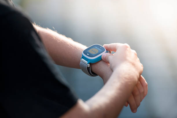 istock Boy calling his mother on his smart watch. 1402742877