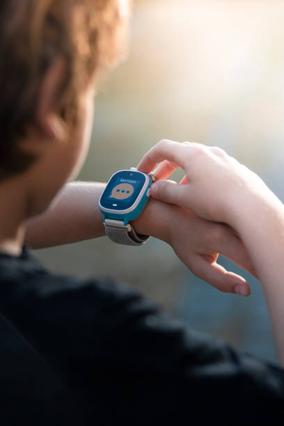 istock Boy calling his mother on his smart watch. 1402742892