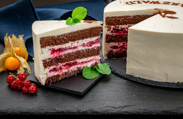 istock Chocolate sponge cake with cherries and white cream. Schwarzwald. 1402743025