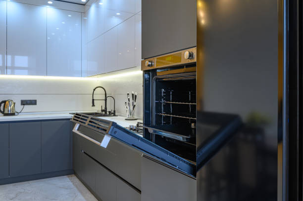 istock Luxury gray modern kitchen interior, oven's door opened 1402745439