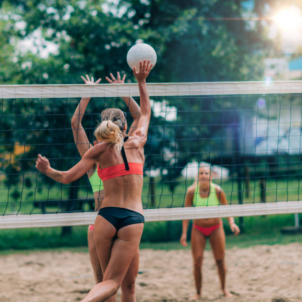 istock Beach Volleyball Players at the Net 1402747203