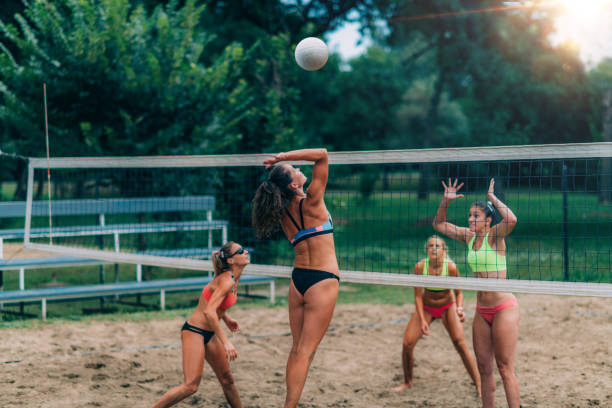 istock Beach Volleyball Players at the Net 1402750236