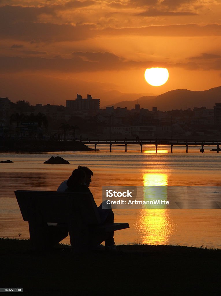 Sunset in Brazil Young couple contemplating the sunset in Florianopolis - Santa Catarina - Brazil Florianópolis Stock Photo