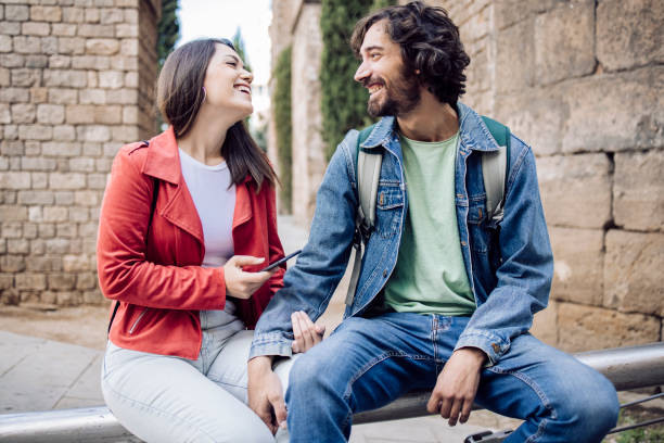 istock Portrait of a young couple taking a break while sightseeing Barcelona 1402753978