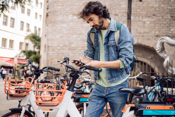 istock Young man on vacation renting an E-bike 1402753980