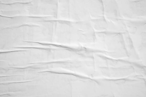istock white crumpled and creased paper poster texture background 1402754158