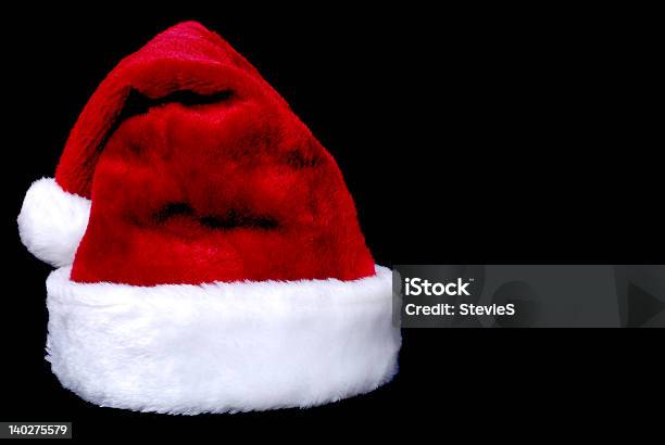 Santas Hat Foto de stock y más banco de imágenes de Ayuda - Ayuda, Blanco - Color, Espacio en blanco