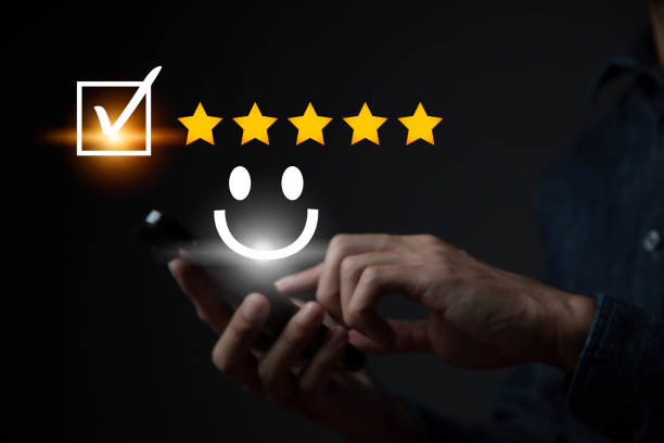 istock Satisfaction and customer service survey concept, business people using  smartphone. to answer the questionnaire And the satisfaction rating, the satisfaction rating with the smiley face icon 5 stars. 1402758293