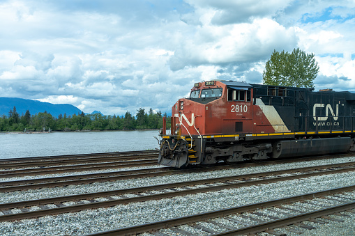 Freight train rounding the bend on the Snake River near Glenns Ferry, Idaho.