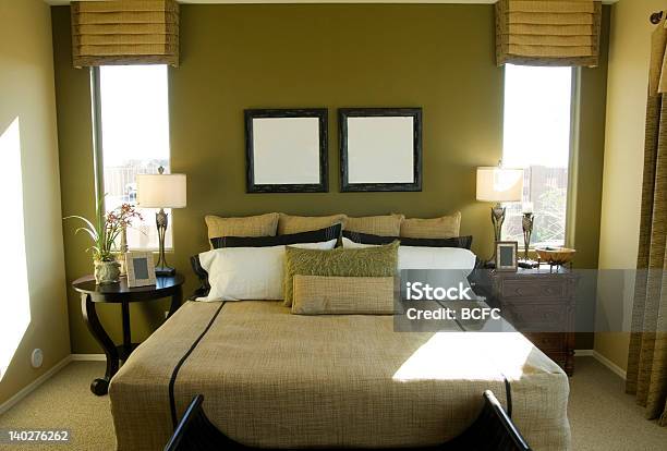 A Modern Bedroom In Greens And Tan Colors Stock Photo - Download Image Now - Bed - Furniture, Bedroom, Blanket
