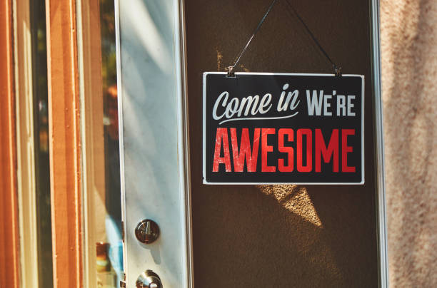 Door sign reading Come In We're Awesome