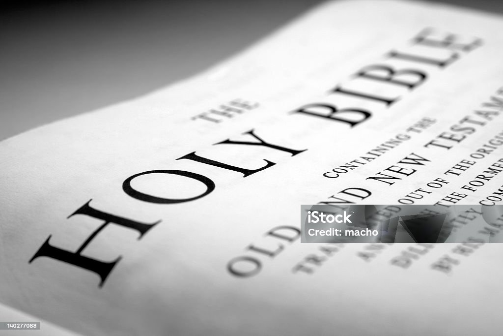 First page of the Holy Bible with old and new testament the holy bible close up Bible Stock Photo